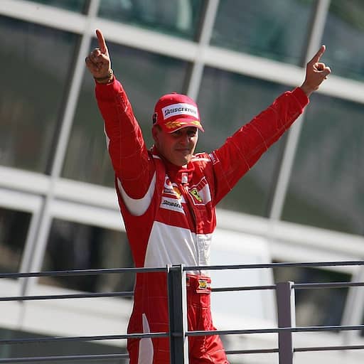 Illustratie bij: Michael Schumacher 30 jaar na eerste zege geëerd op Monza: 'Mooi van Ferrari'