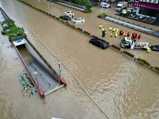 Oost-Azië worstelt met tyfoons: Peking ervaart ergste regenval in 140 jaar
