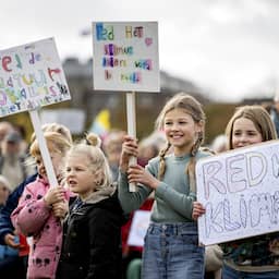 In beeld | Tienduizenden mensen op de been voor klimaatmars door Den Haag
