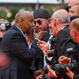 Video | Opdringerige fotograaf krijgt standje van Denzel Washington in Cannes