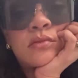 Video | Rihanna gets children's drawing tattooed on her leg