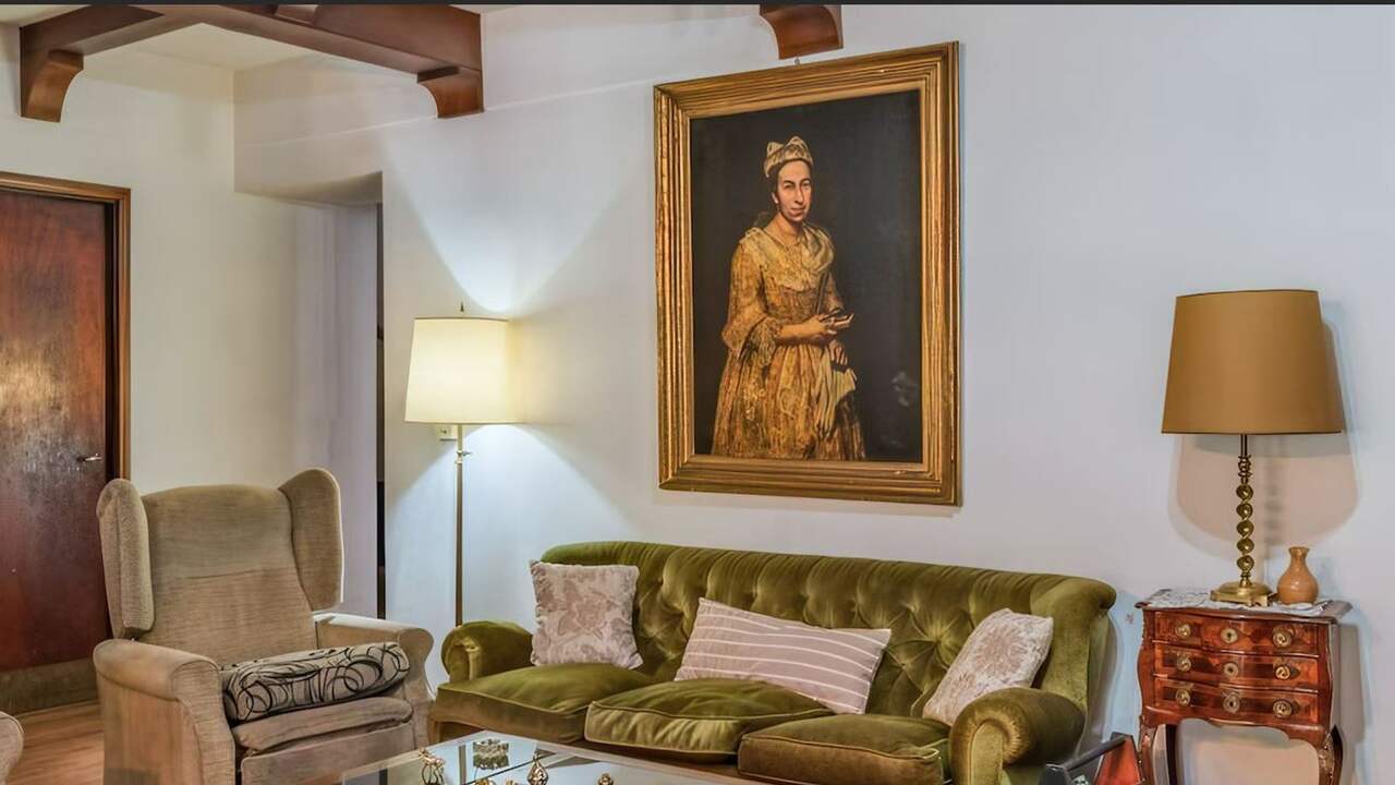 Foto bij Argentijns stel geeft door nazi's gestolen schilderij terug aan erfgenaam