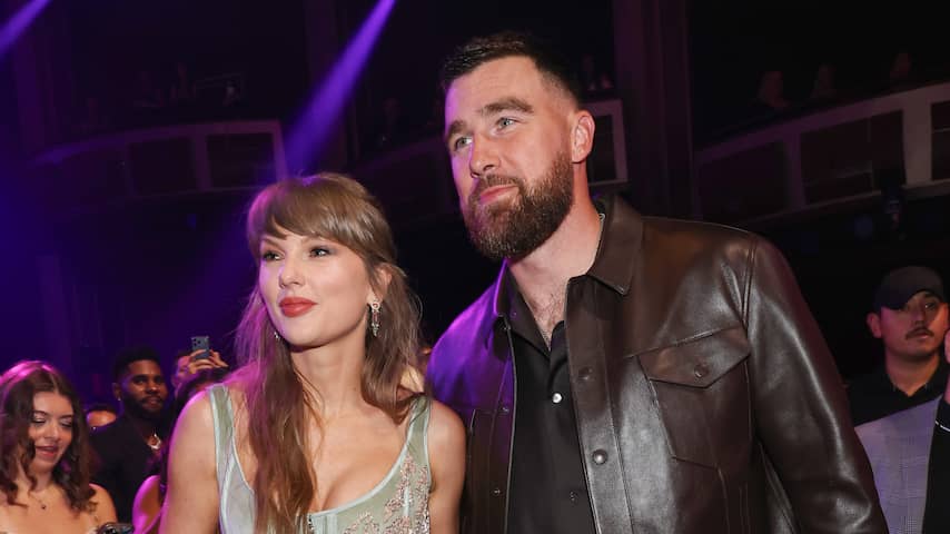 Foto bij Travis Kelce vond bruiloft met Taylor Swift 'mooiste avond' van zijn leven