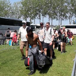 Video | Duizenden feestgangers verlaten snikheet Defqon.1-terrein