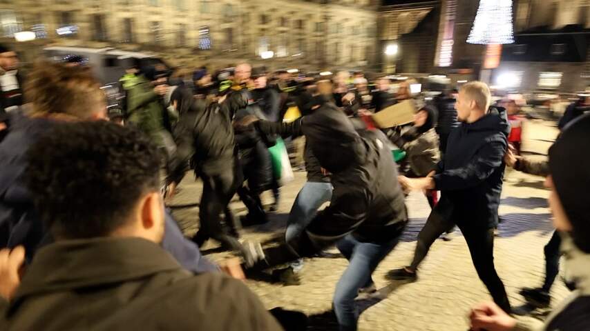 Politie grijpt in bij opstootjes tijdens verboden protest op de Dam