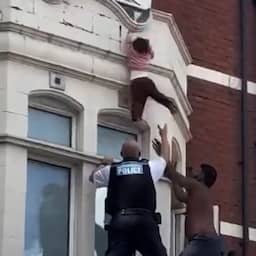 Video | Omstander vangt peuter die uit raam valt in Engeland